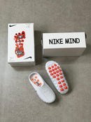 Slide Nike Mind 001