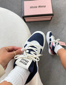 Miu MIU Gymnasium em tecido técnico e camurça