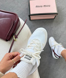 Miu MIU Gymnasium em tecido técnico e camurça