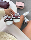 Miu MIU Gymnasium em tecido técnico e camurça